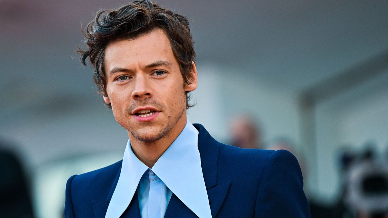 British singer and actor Harry Styles arrives on September 5, 2022 for the screening of the film "Don't Worry Darling" presented out of competition as part of the 79th Venice International Film Festival at Lido di Venezia in Venice, Italy. 