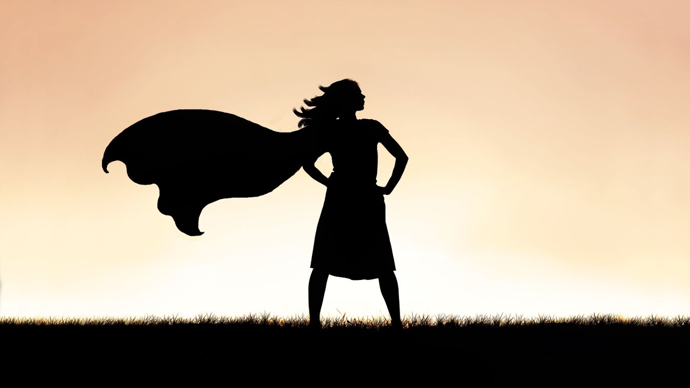 The,Silhouette,Of,A,Strong,,Beautiful,Caped,Superhero,Woman,Stands