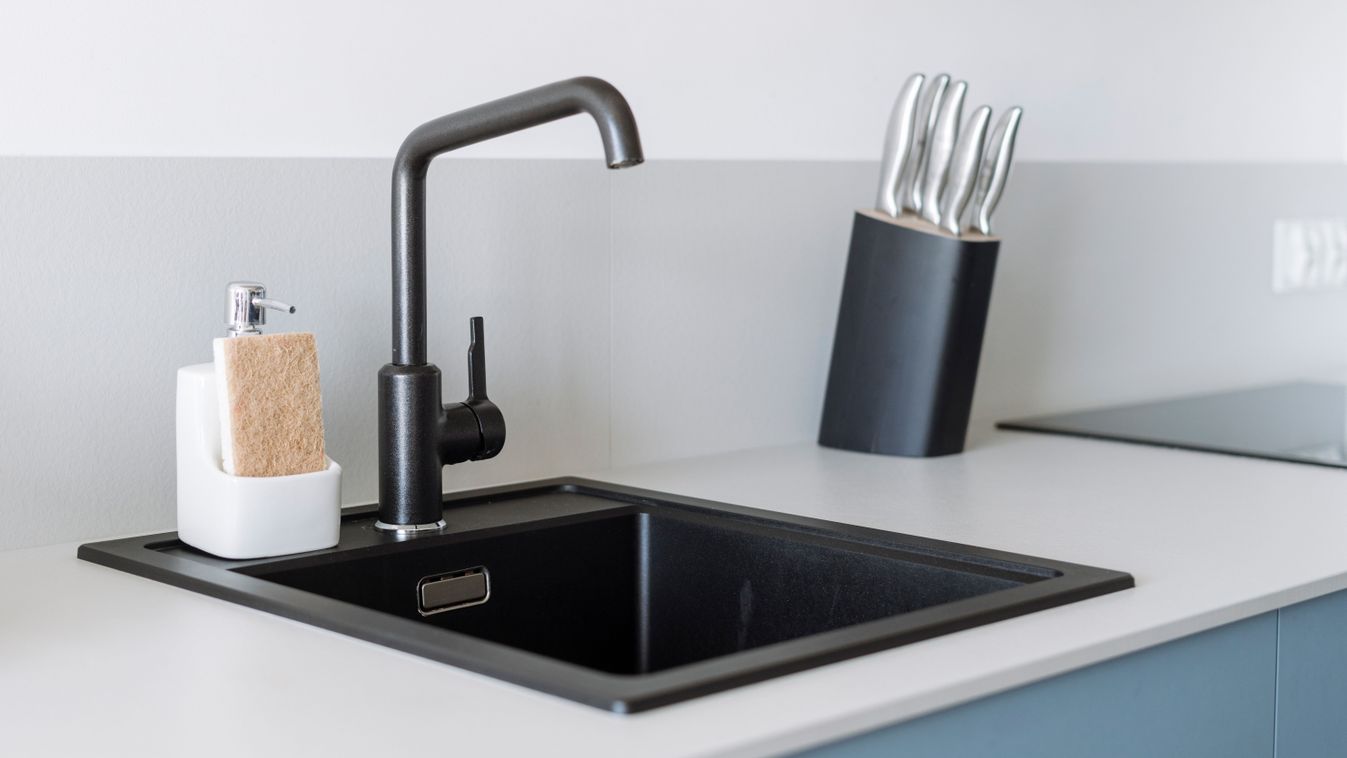 Modern,Granite,Sink,And,Black,Water,Tap,In,Domestic,Kitchen.