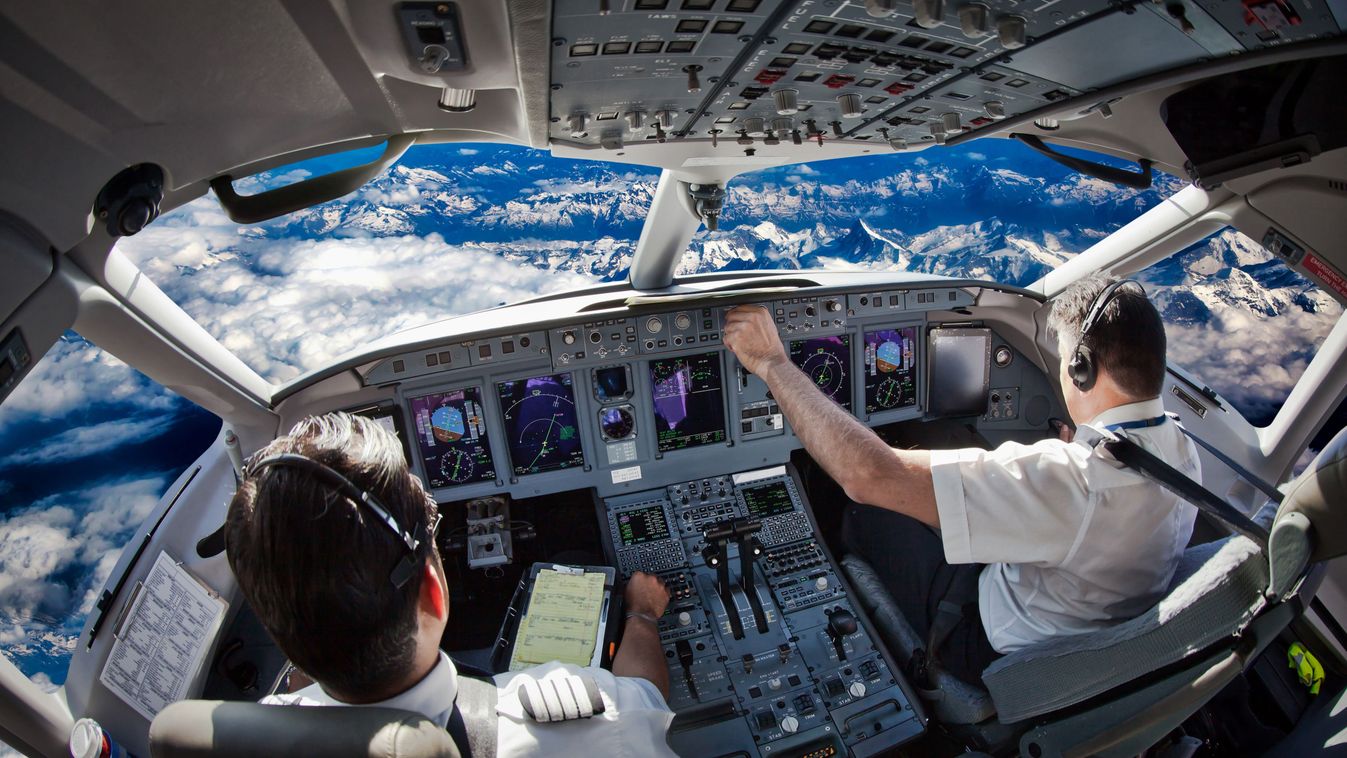 Cockpit,Of,The,Modern,Passenger,Aircraft,In,Flight.,Pilots,Fly