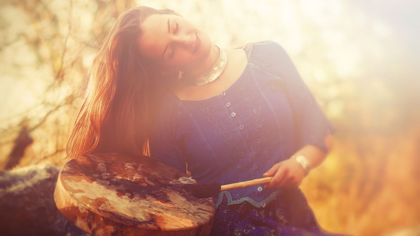Beautiful,Shamanic,Girl,Playing,On,Shaman,Frame,Drum,In,The