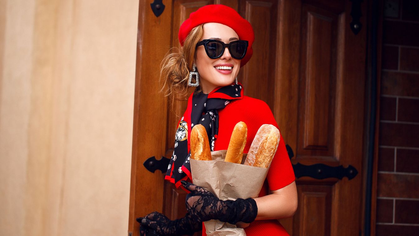Beautiful,Woman,In,Red,Beret,And,Dress,Walks,Down,The