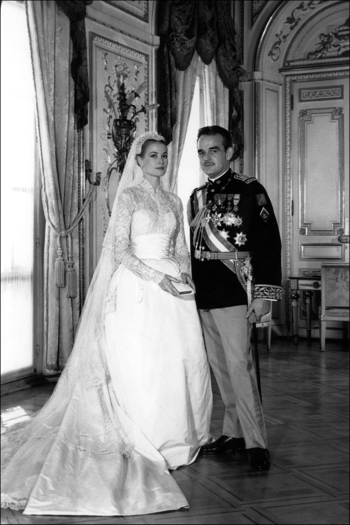 Grace Kelly and Prince Rainier of Monaco during their wedding ceremony in Monaco on April 19, 1956. (Photo by AFP)