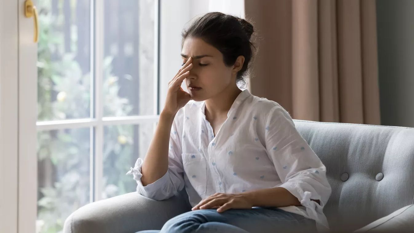 Depressed,Frustrated,Young,Indian,Woman,Suffering,From,Headache,,Migraine,,Touching