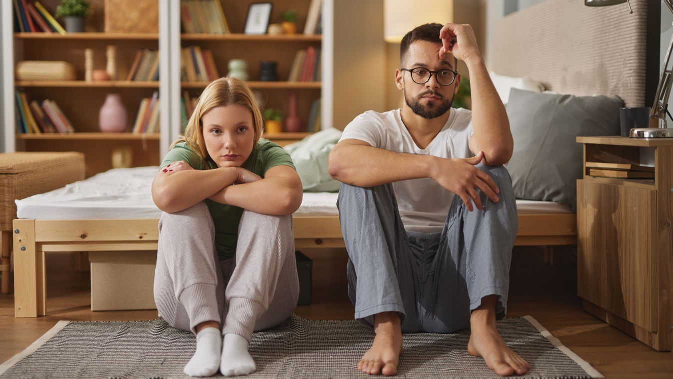 Upset,Couple,Ignoring,Each,Other,After,Fight,In,Bedroom