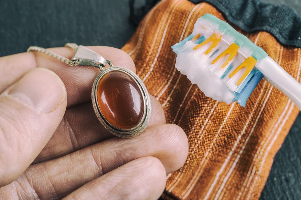 Cleaning,Silver,Jewellery,With,And,Toothbrush,And,Baking,Soda