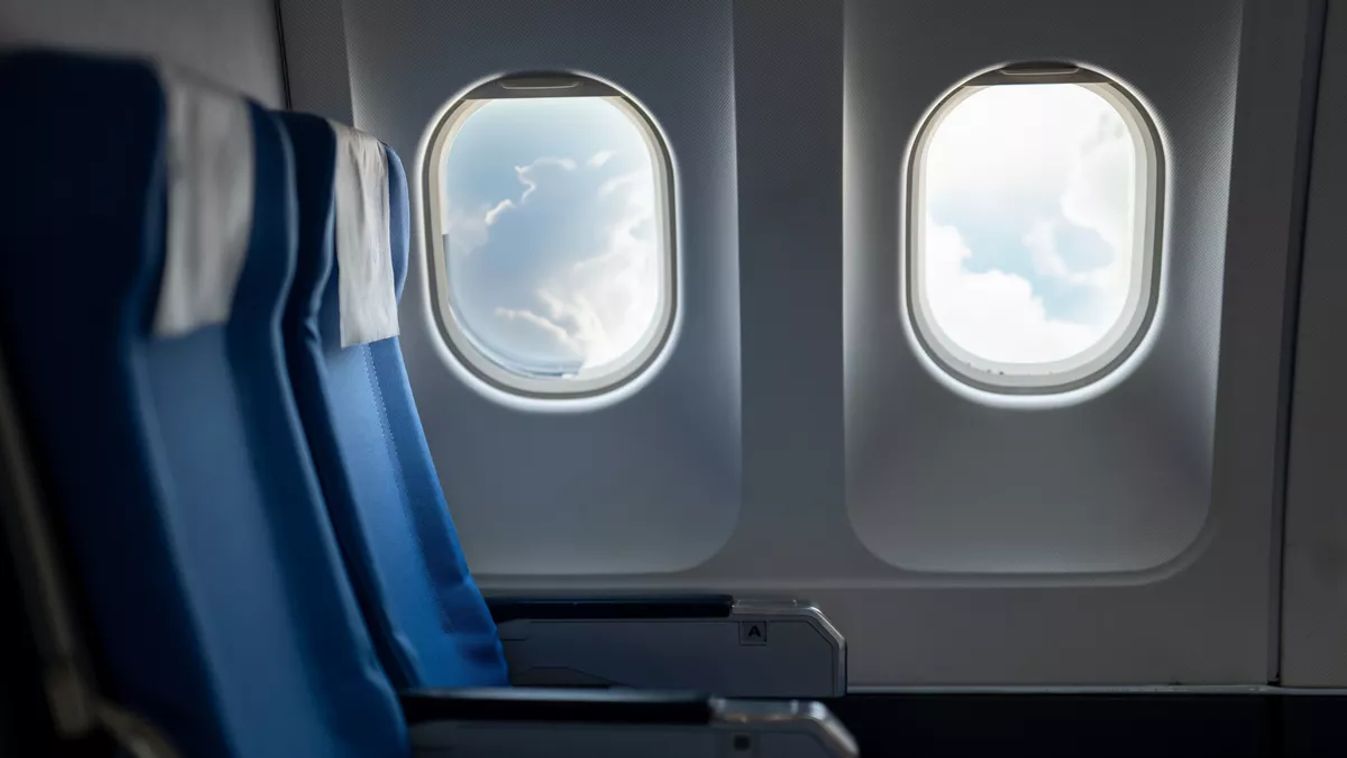 The,Calming,Scene,Of,Empty,Blue,Airplane,Seats,Beside,A