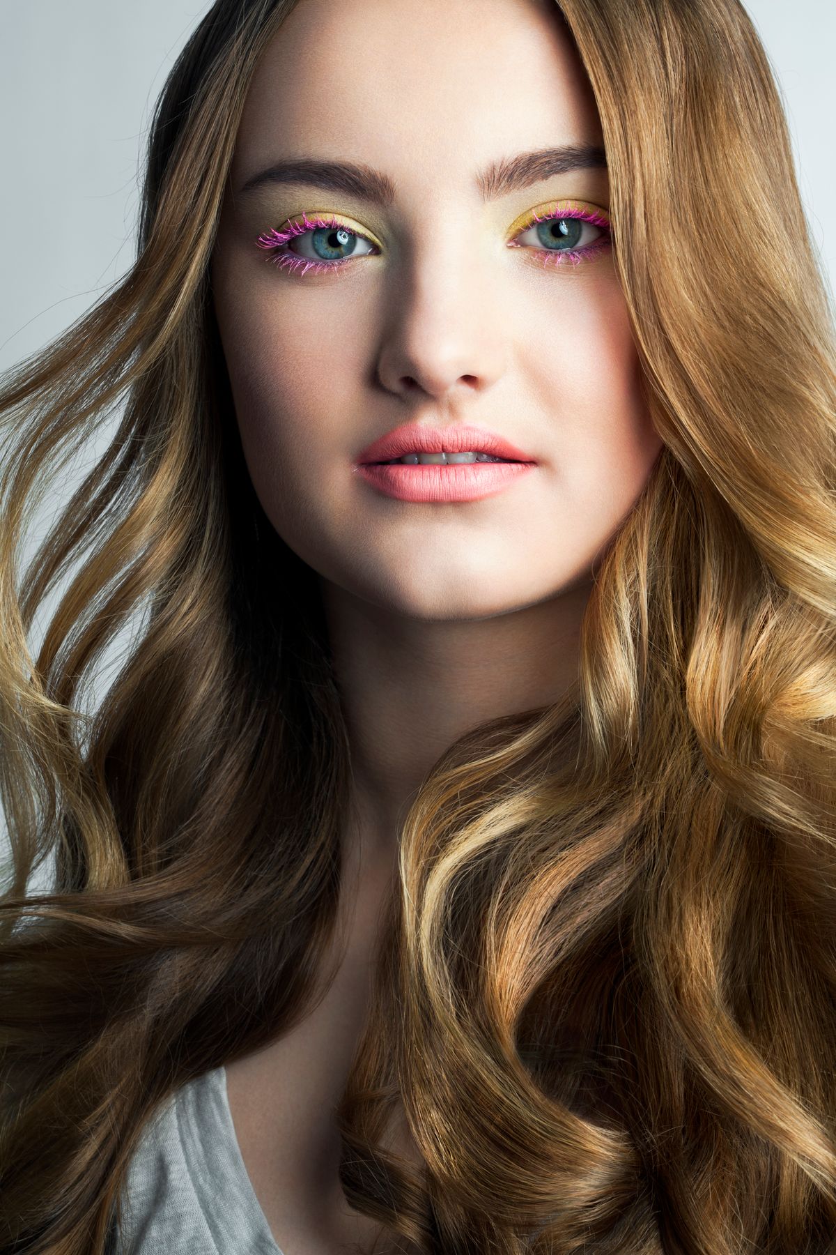 Teenage girl with colorful make up, portrait.