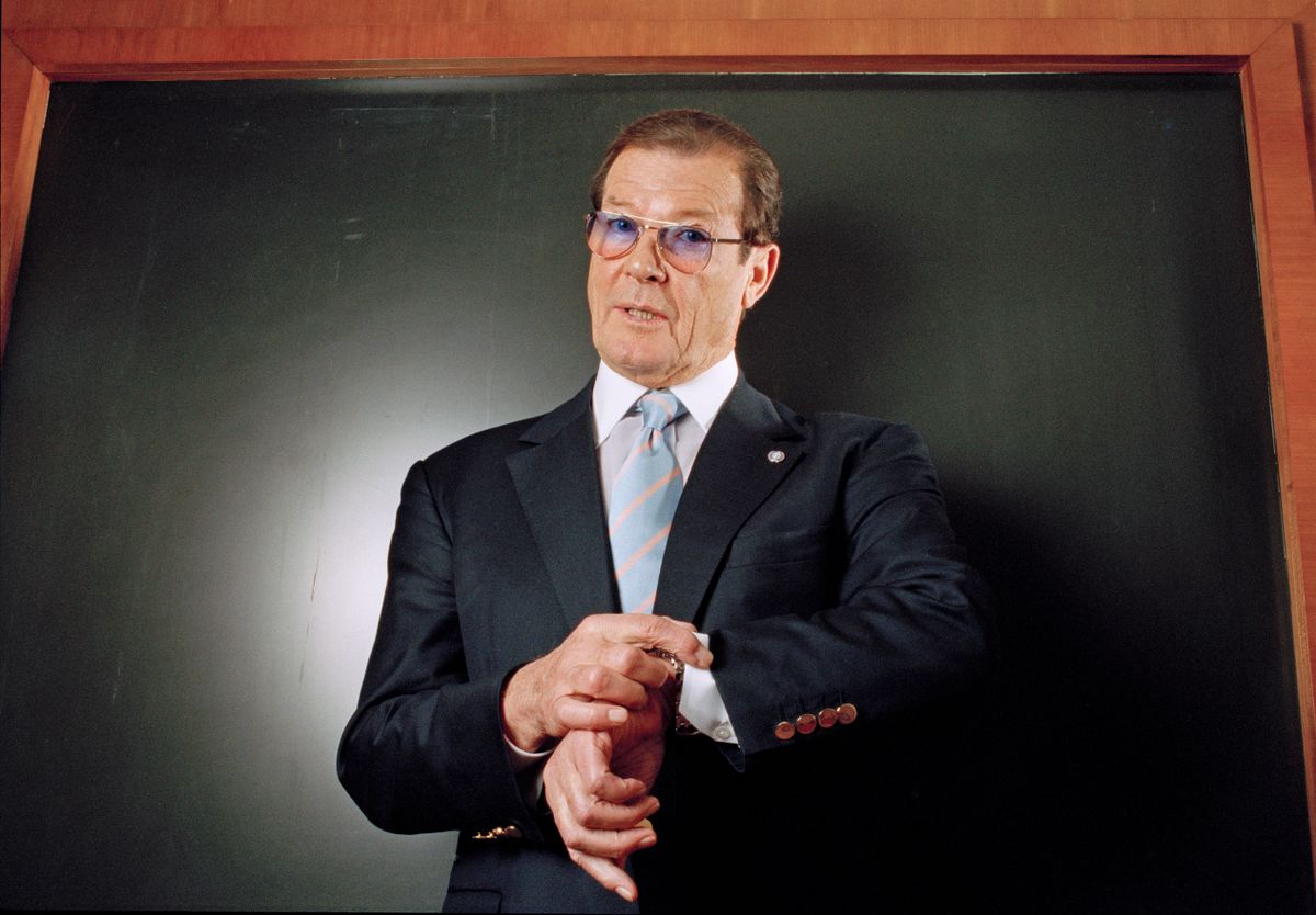 Sir Roger Moore, English actor and film producer, best known for portraying British secret agent James Bond. Photographe