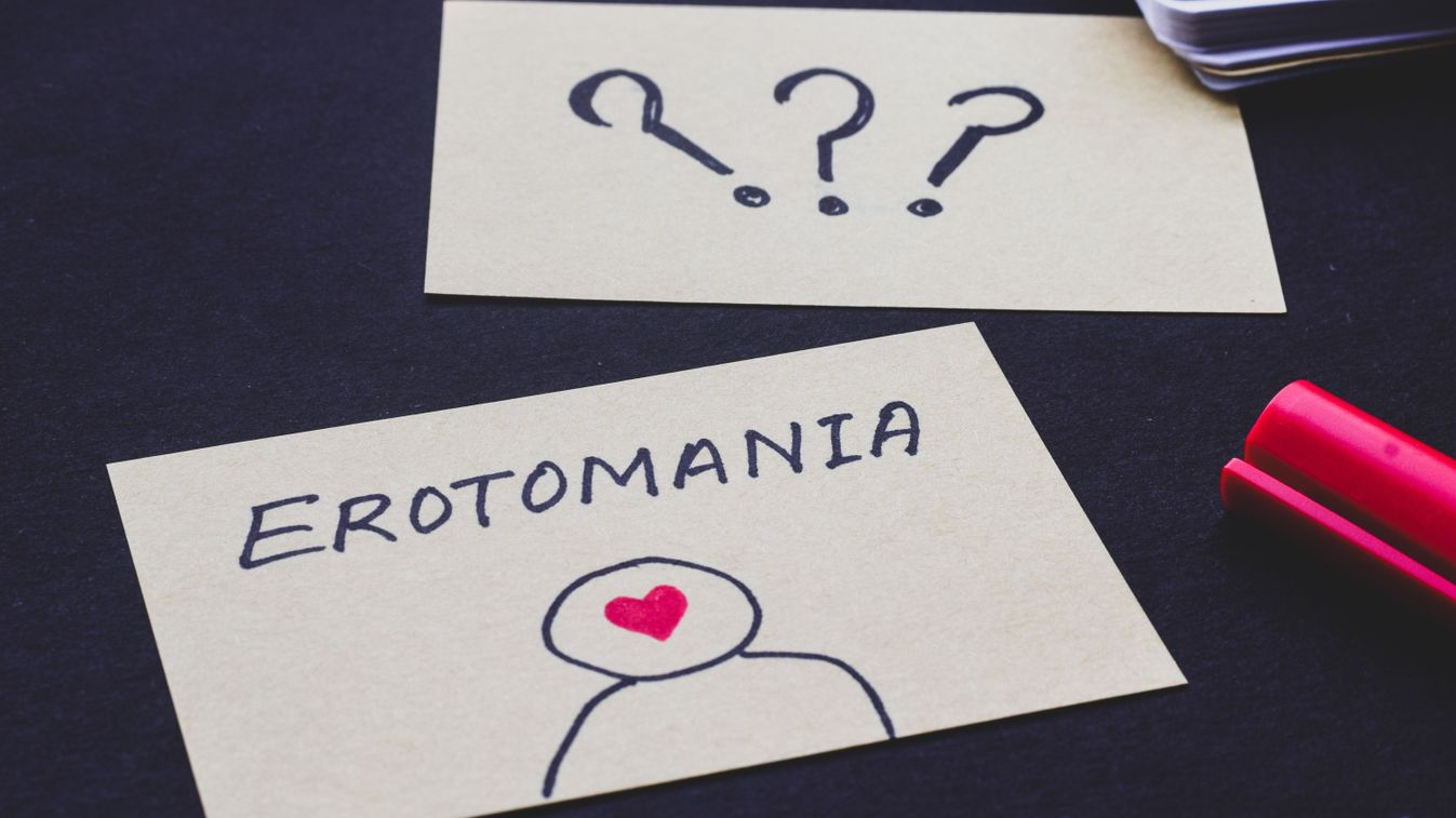 What,Is,Erotomania,Text,With,Hand,Drawing,On,Cards.,A