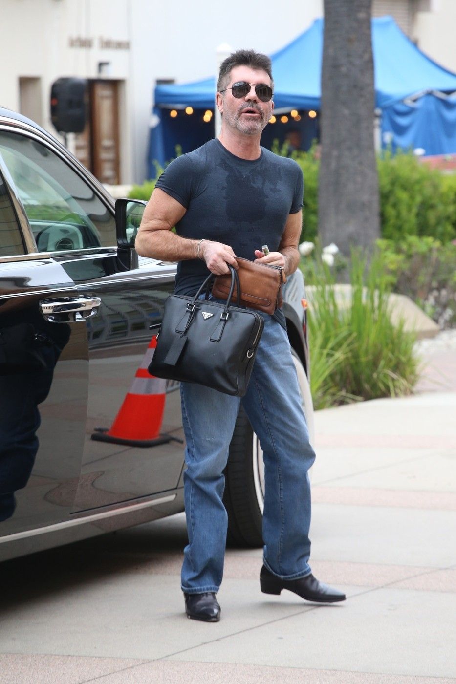 *EXCLUSIVE* Simon Cowell seen arriving in a sweaty shirt at AGT