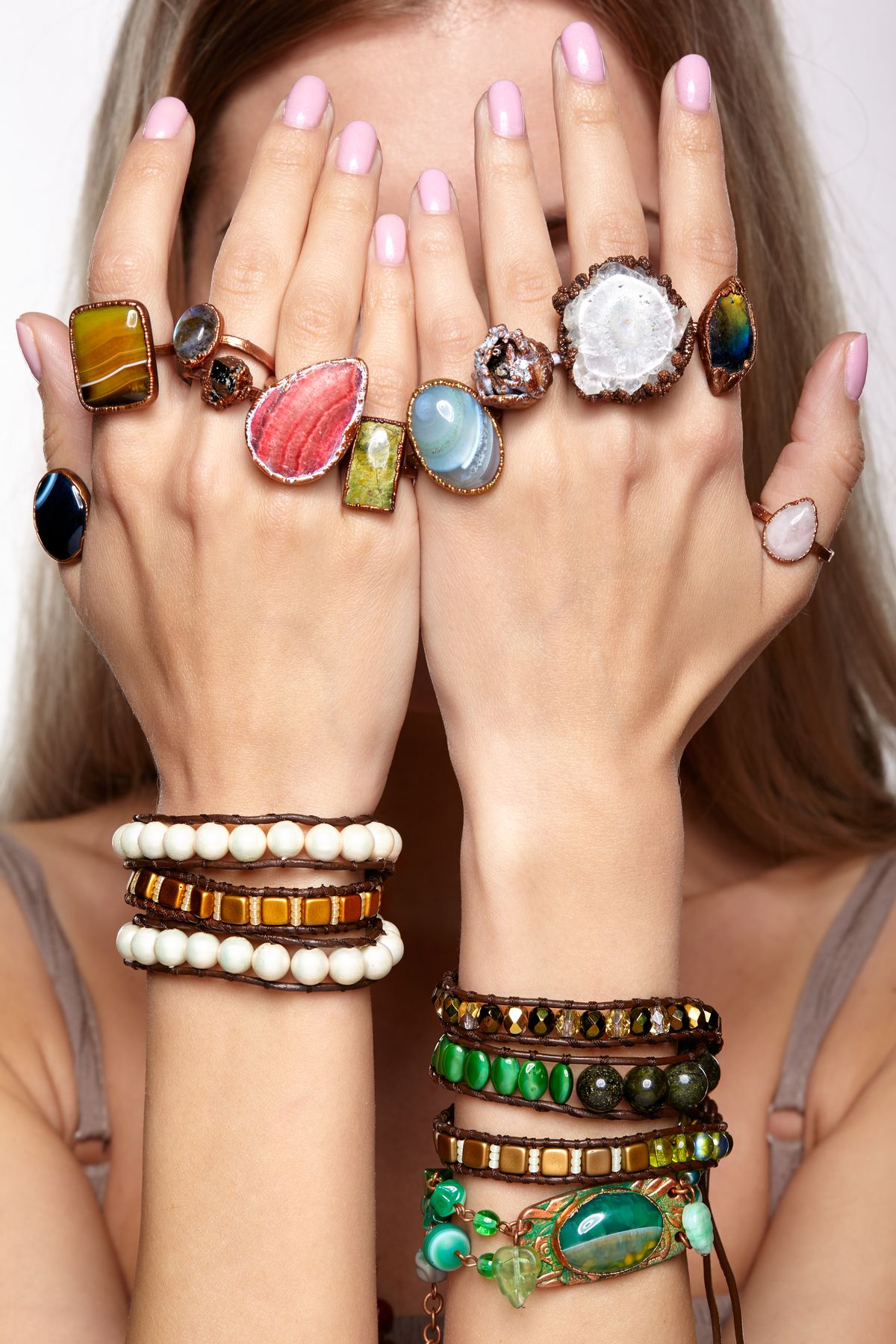 Young,Woman,Hands,With,Multiple,Bracelets,And,Fingers,With,Many