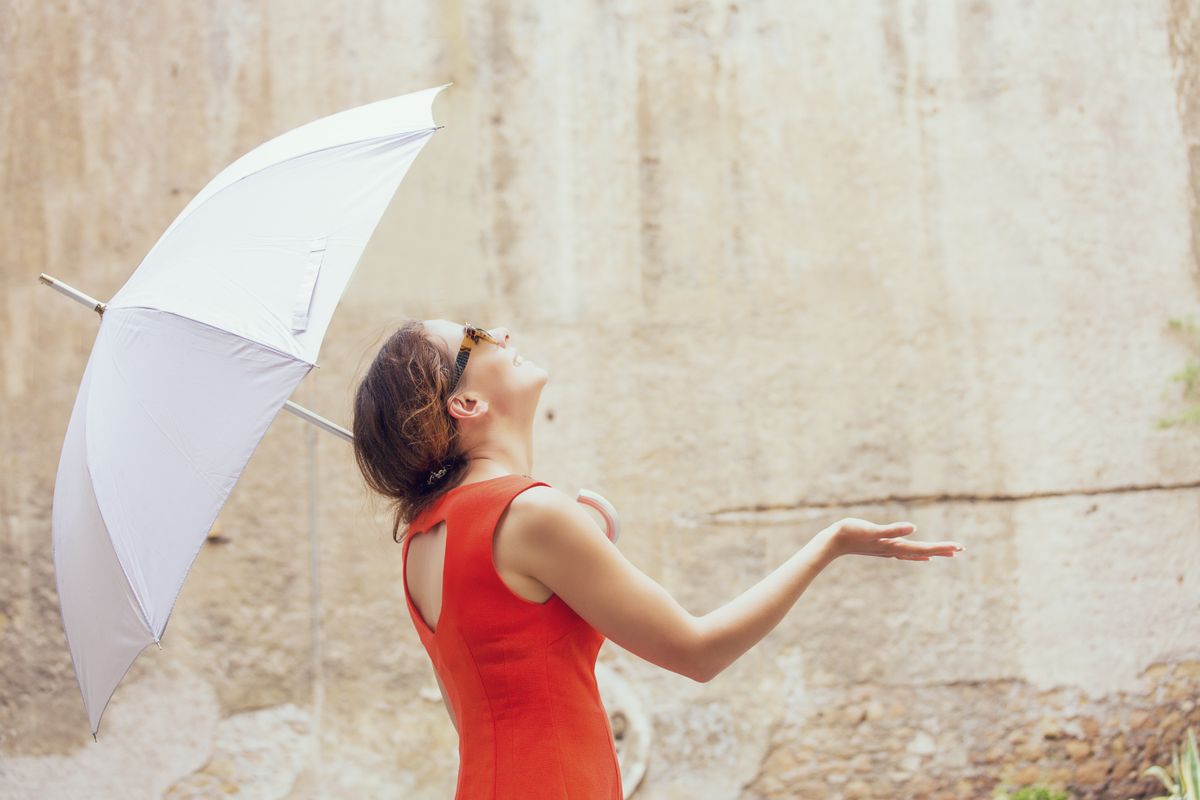 Beautiful,Joyful,Young,Woman,Under,White,Umbrella