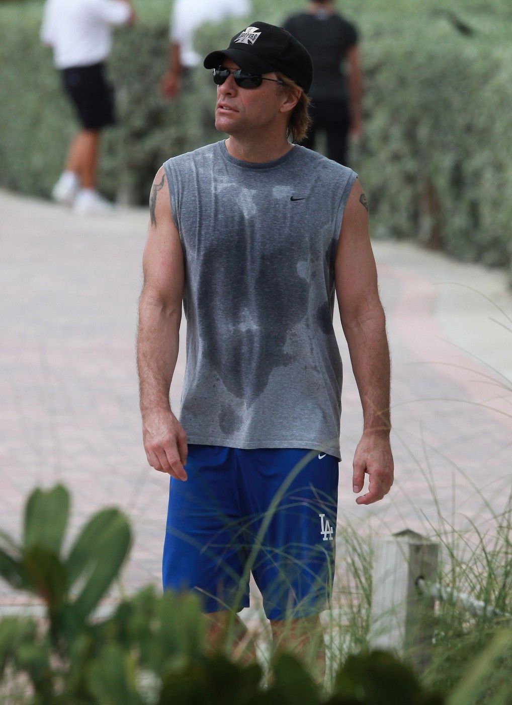 Jon Bon Jovi Works Up A Sweat with His Air Guitar!