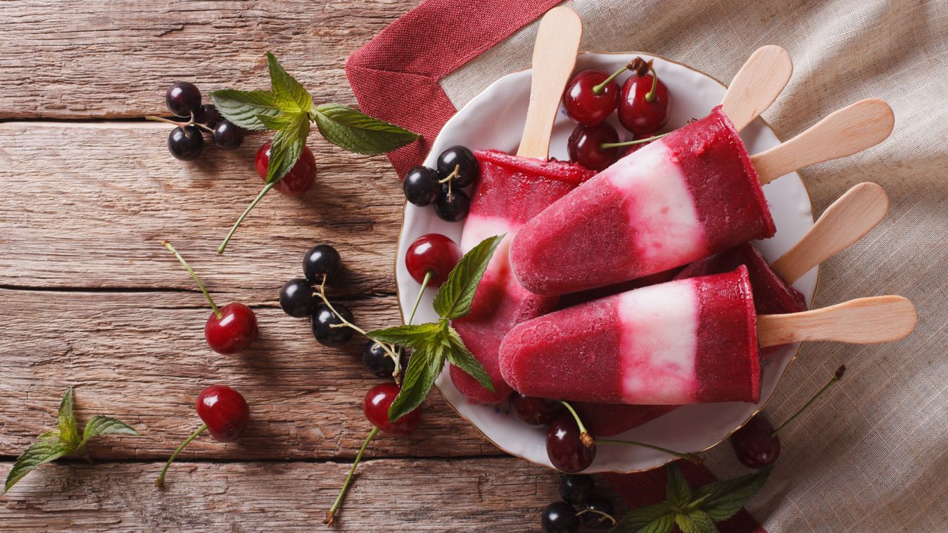 Homemade,Popsicle,With,Mint,And,Cherry,On,A,Stick,Close-up