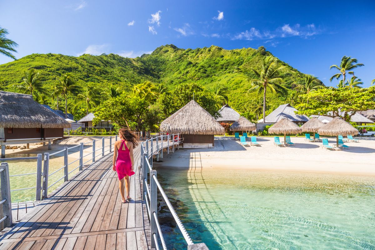 Overwater,Bungalow,Hotel,Resort,In,Tahiti,,Moorea,Island.,Person,On