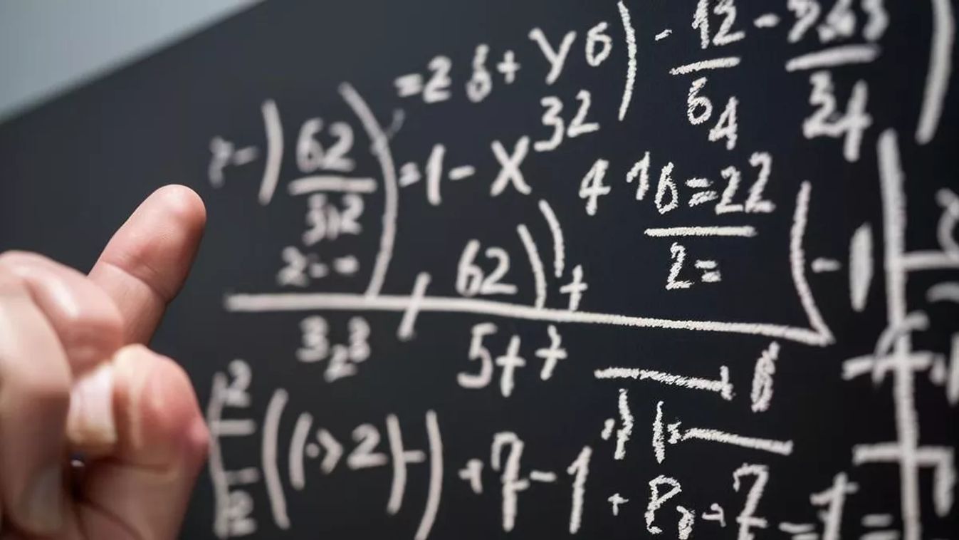 Showing,Person,Focusing,On,A,Complex,Math,Equation