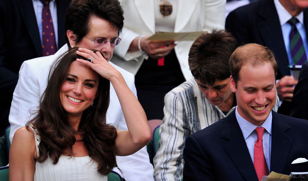 Britain's Prince William (R) and his wife Catherine the Duchess of Cambridge, are pictured on Centre Court as they watch Britain's Andy Murray and France's Richard Gasquet at the 2011 Wimbledon Tennis Championships at the All England Tennis Club, in south-west London, on June 27, 2011. AFP PHOTO/GLYN KIRK/RESTRICTED TO EDITORIAL USE 