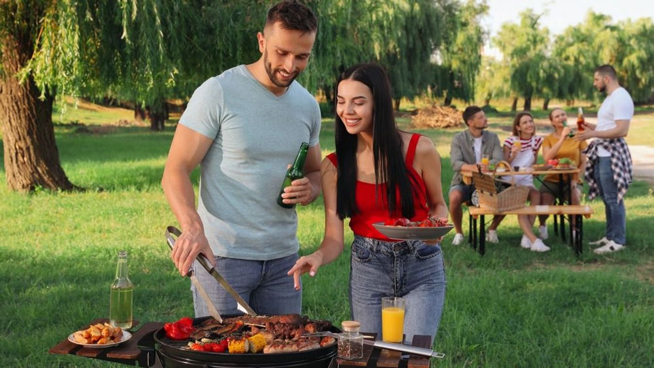 Happy,Friends,Cooking,Meat,And,Vegetables,On,Barbecue,Grill,In