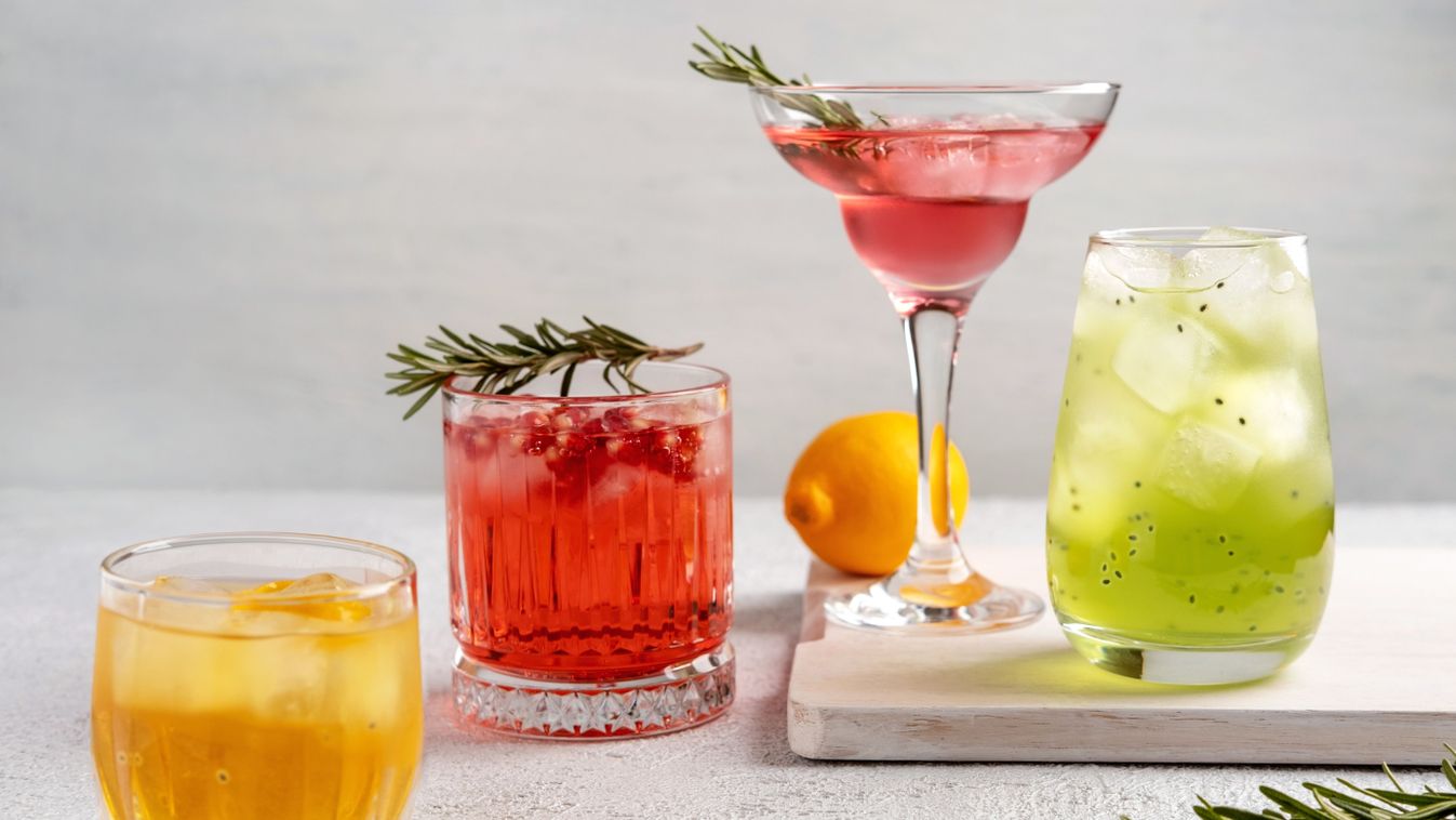 Four,Colorful,Summer,Cocktails,In,Glasses,On,White,Table.,Assortment