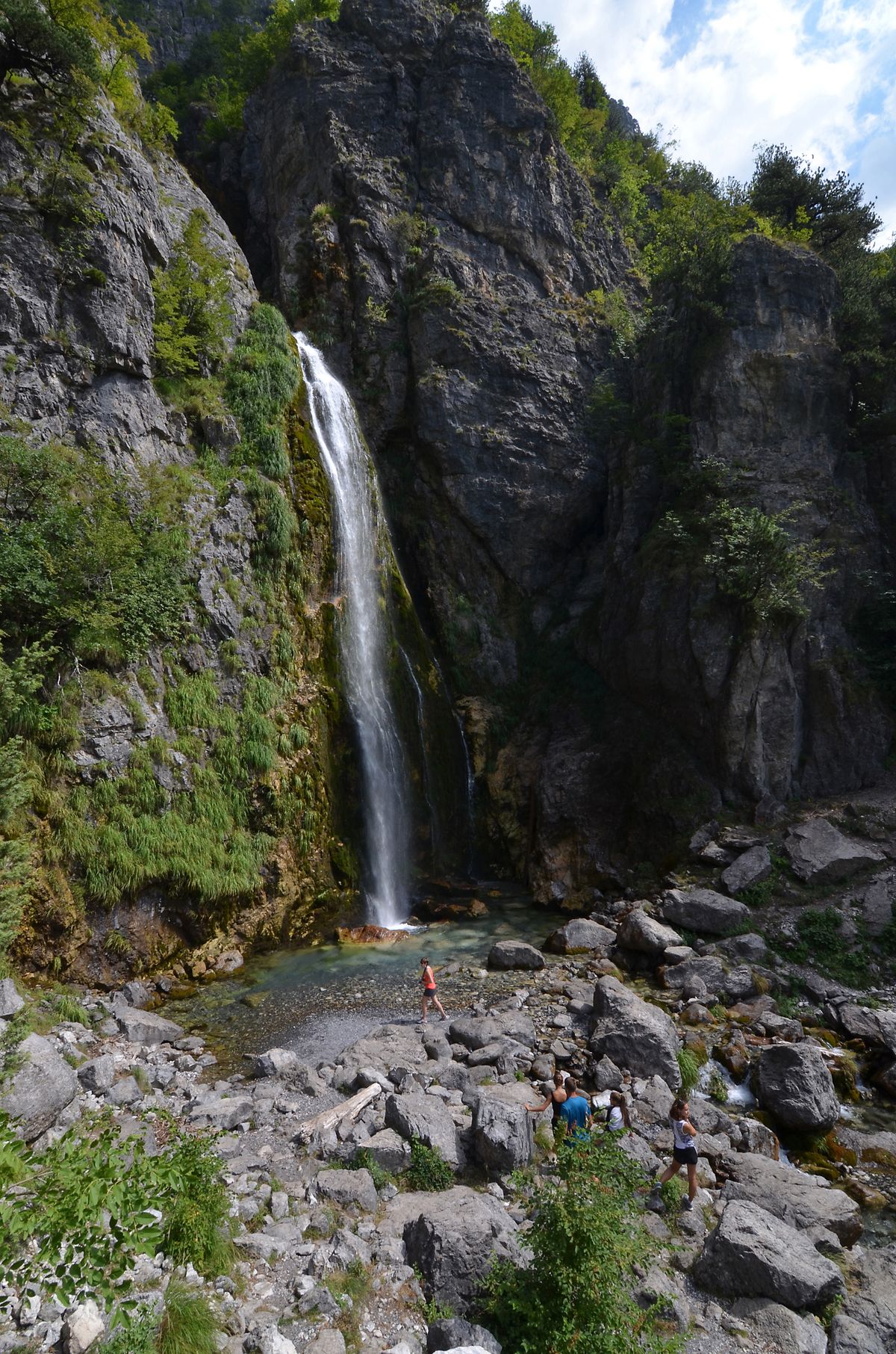 The beautiful Grunasi waterfall. where the water falls for tens of meters in a deep pool. Albania. Europe. of Thethi National Park