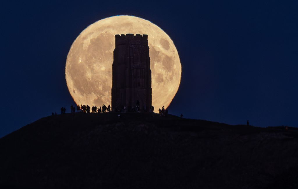 Harvest Supermoon Rises Over Glastonbury Tor