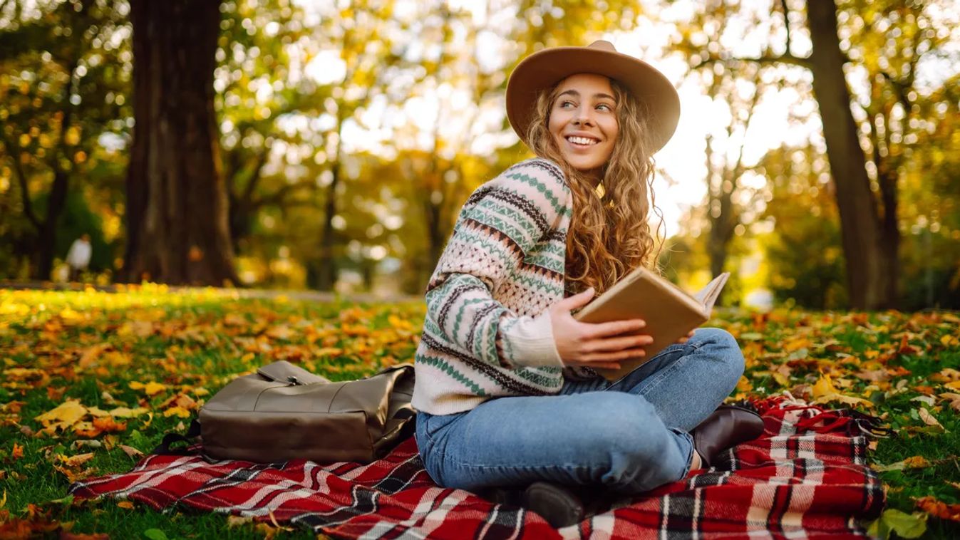 Young,Woman,Reading,Book,At,Autumn,Park.,Concept,Of,Autumn