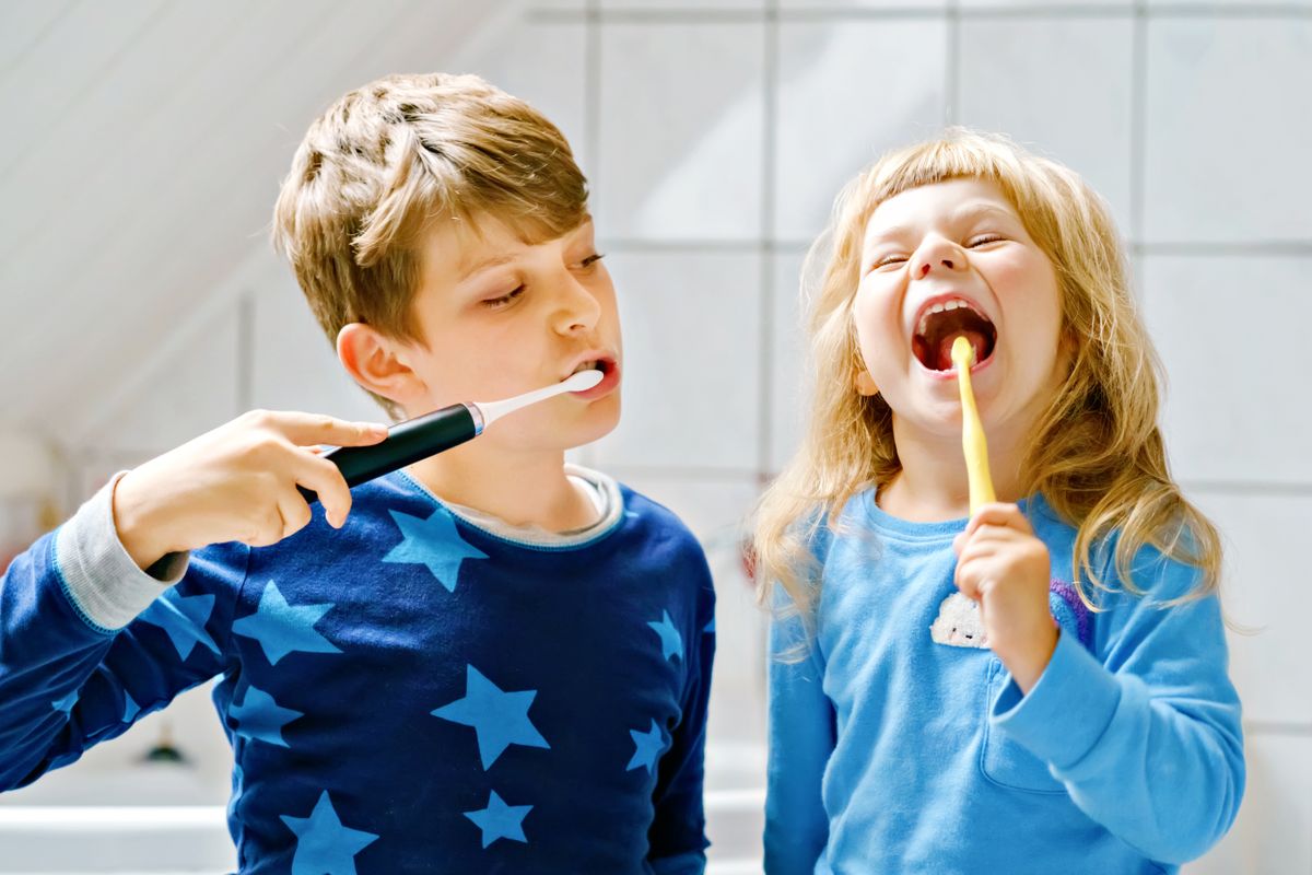 Little,Preschool,Girl,And,Preteen,School,Boy,Brushing,Teeth.,Brother