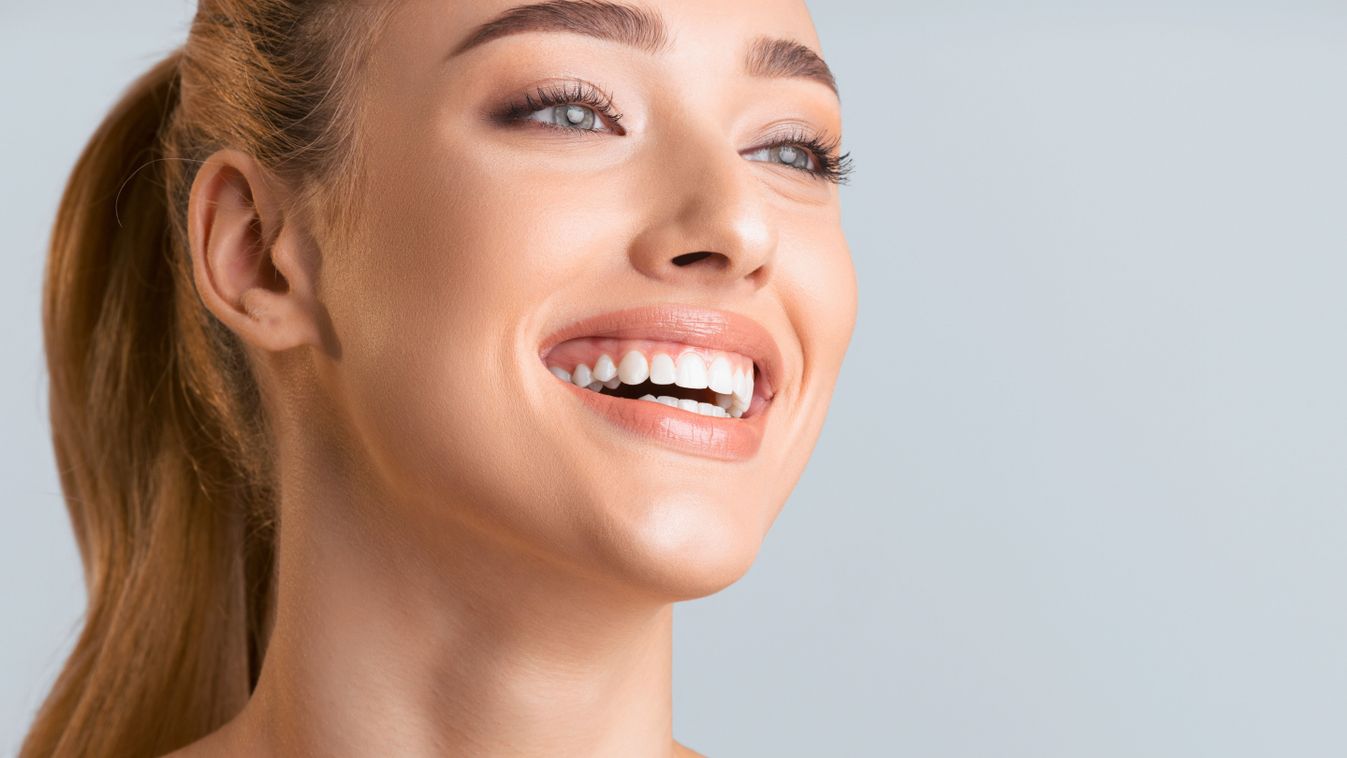 A,Close-up,Portrait,Of,A,Young,Woman,With,Light,Brown