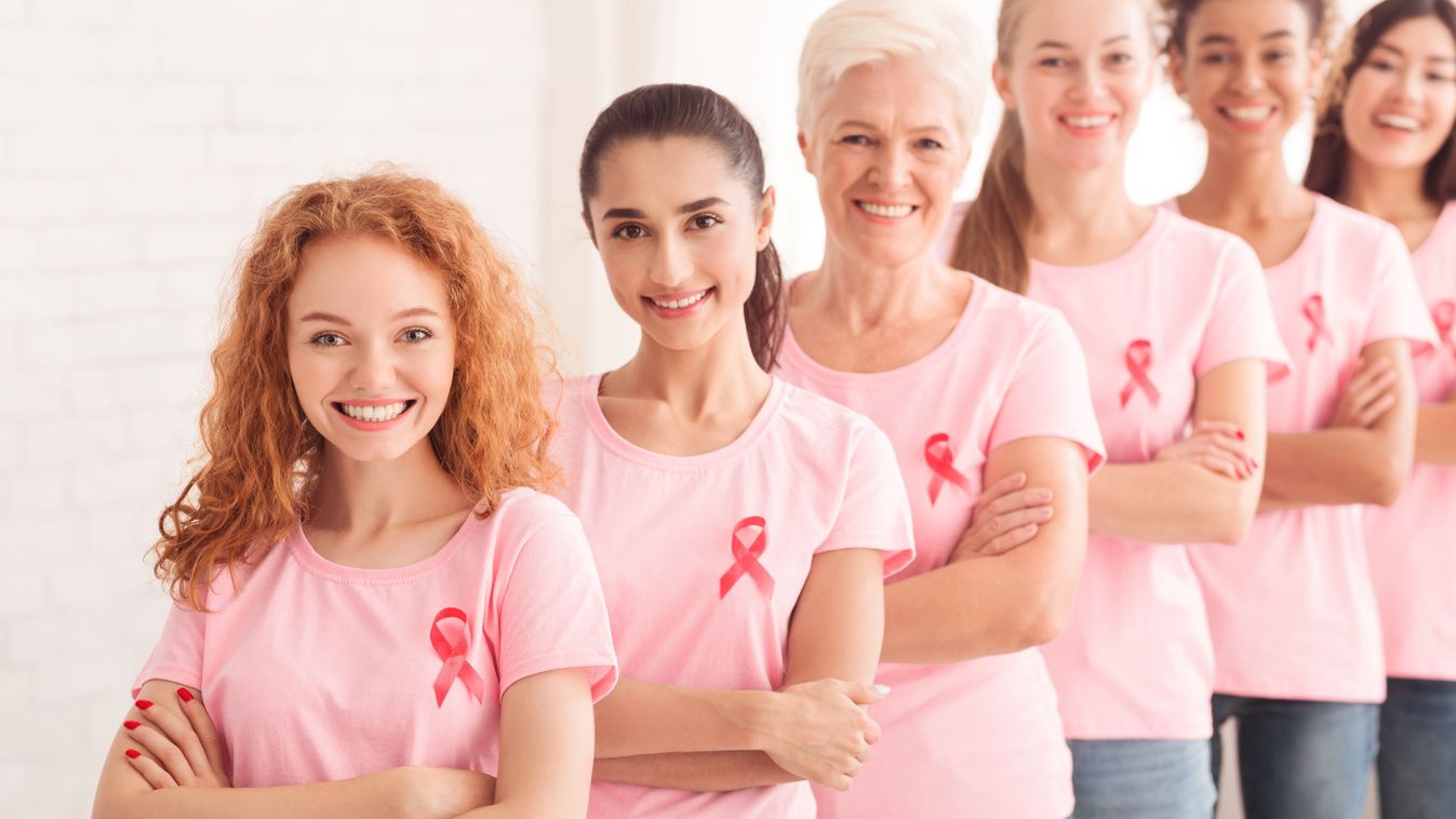 Multiethnic,Ladies,Volunteers,In,Pink,Cancer,Awareness,T-shirts,Standing,Together