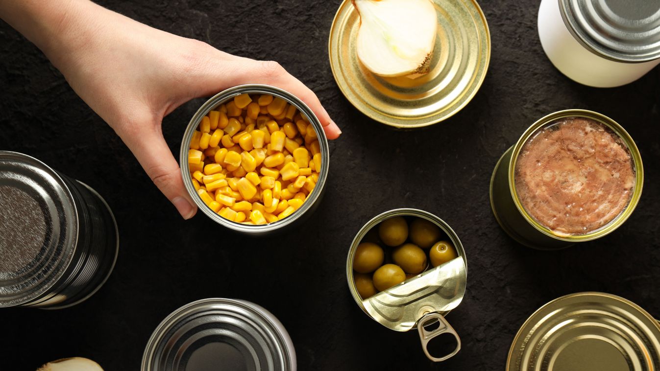 Cans,With,Food,,On,A,Dark,Background.