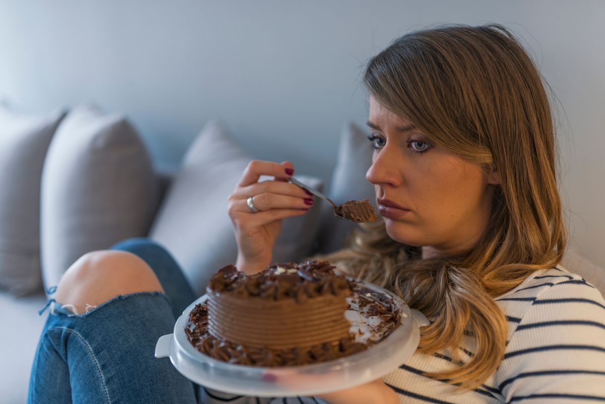 Depressed,Woman,Eats,Cake.,Sad,Unhappy,Woman,Eating,Cake.,Sad