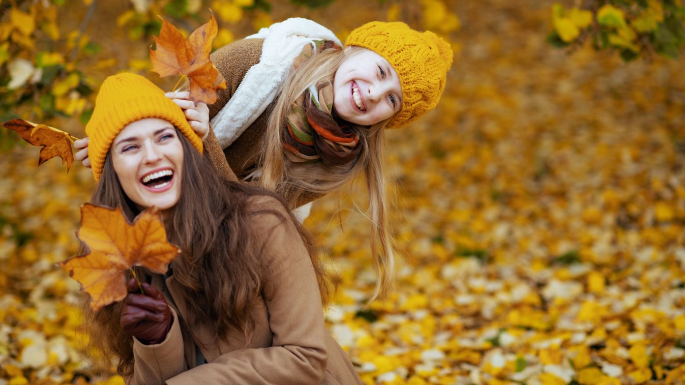 Hello,October.,Happy,Young,Mother,And,Daughter,In,Orange,Hats