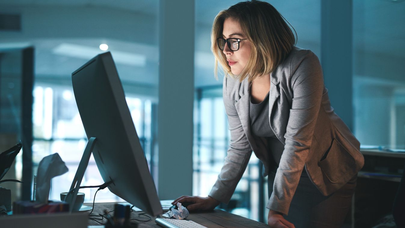 Woman,,Employee,And,Reading,On,Computer,In,Office,On,Browsing