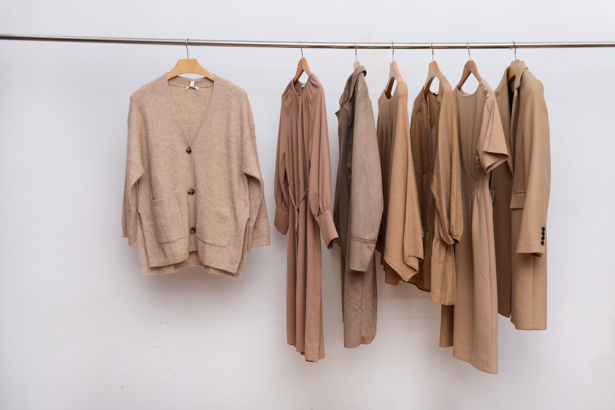 Collection,Of,,dress,Sweatshirt,,sweater,And,Jacket,,suit,coat,Hanging,On