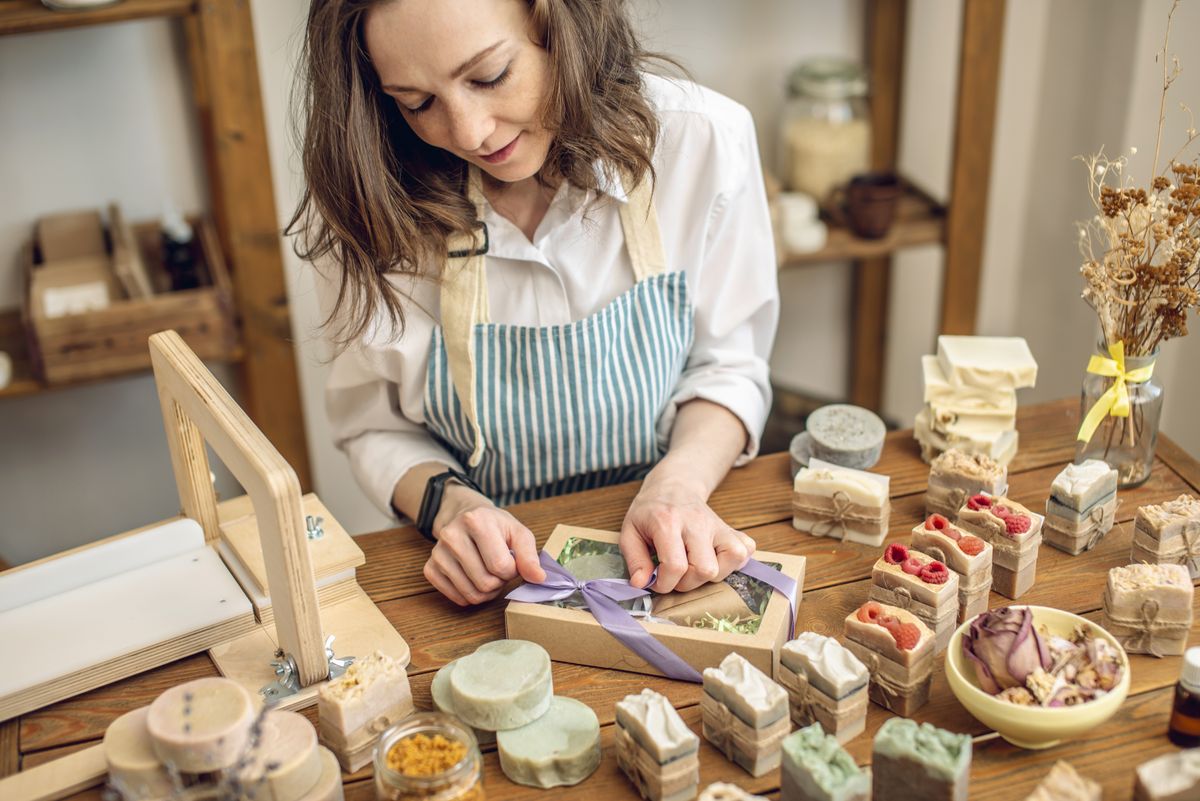 Woman,Soap,Maker,In,A,Workshop,Is,Packing,In,The