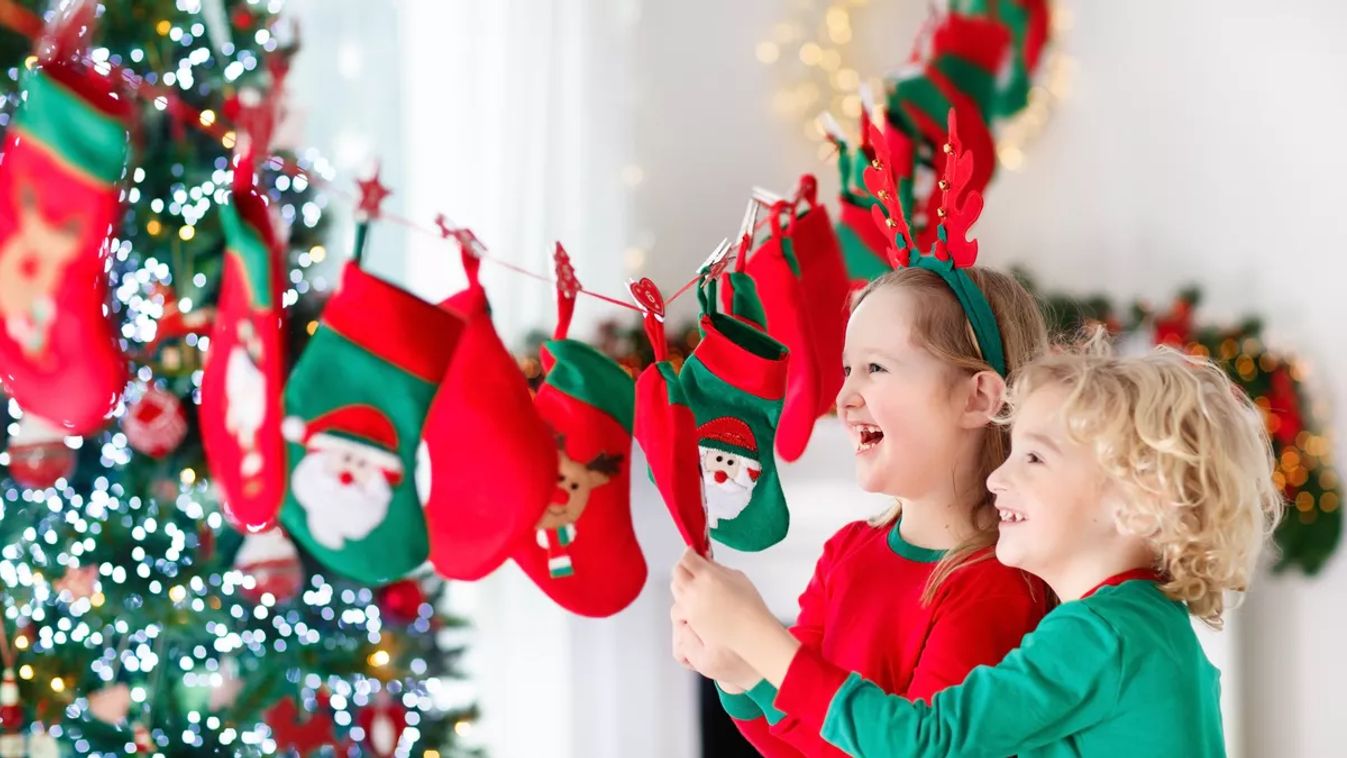 Kids,Opening,Christmas,Presents.,Child,Searching,For,Candy,And,Gifts