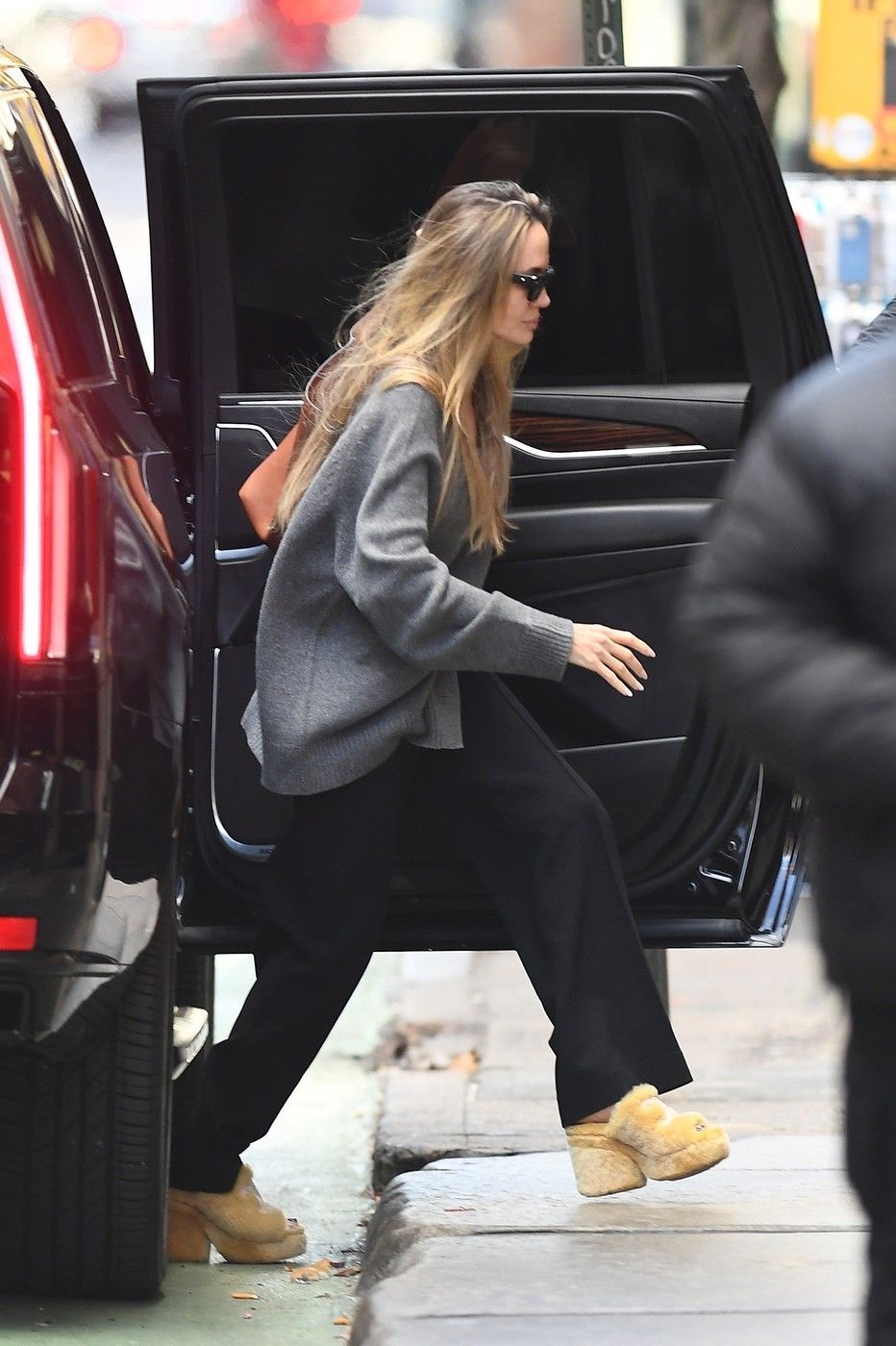 *EXCLUSIVE* Normally understated, Angelina Jolie steps out in cold New York City in a unique pair of Shearling mules!