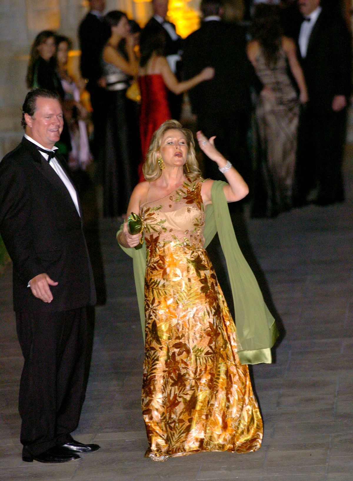 Kathy Hilton blows a kiss as she and husband Rick Hilton arr