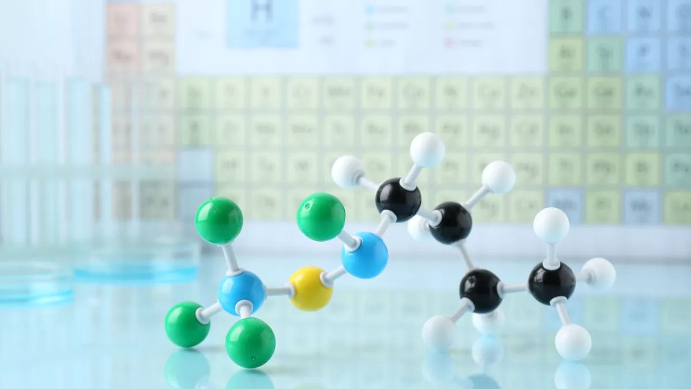 Molecular,Model,On,Light,Surface,Against,Blurred,Background