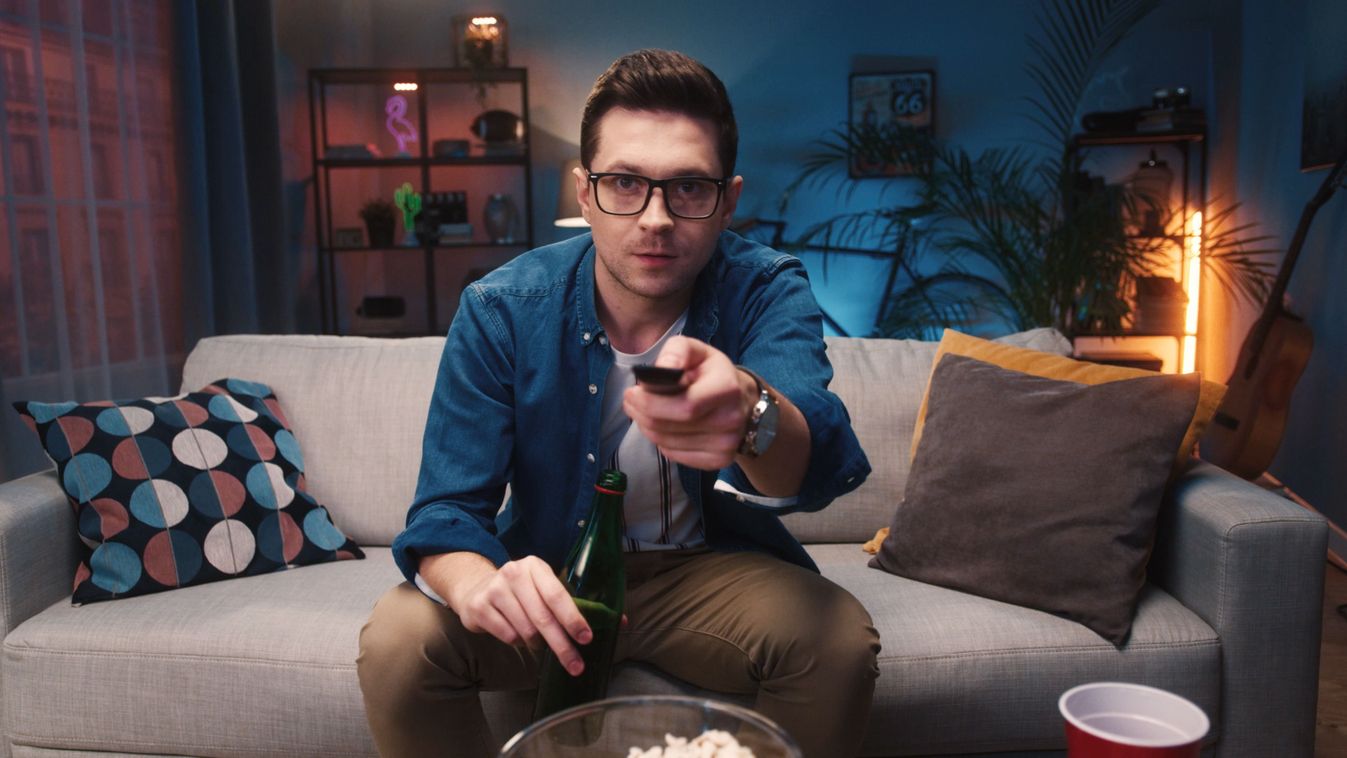 Close,Up,Of,Caucasian,Young,Handsome,Guy,In,Glasses,Watching