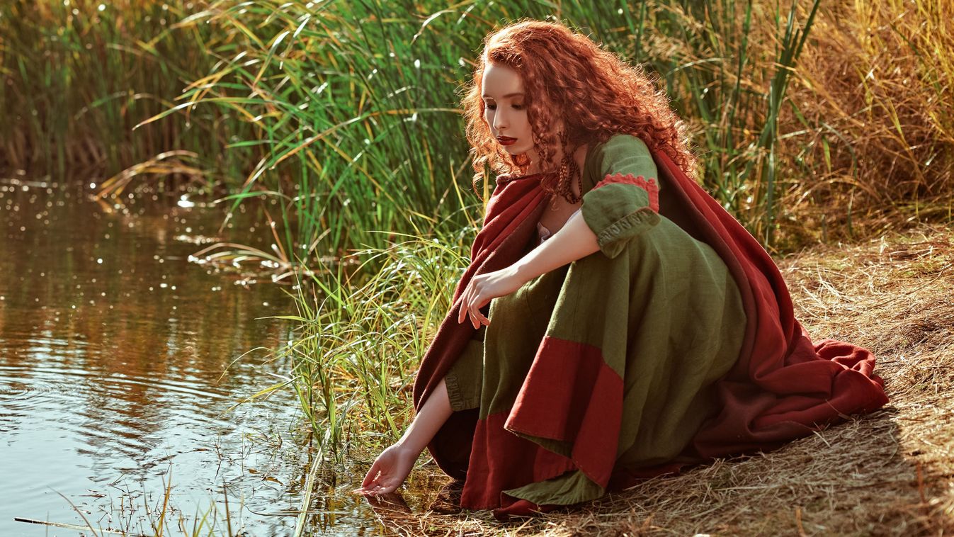 Beautiful,Red,Haired,Girl,In,A,Traditional,Green,Celtic,Dress