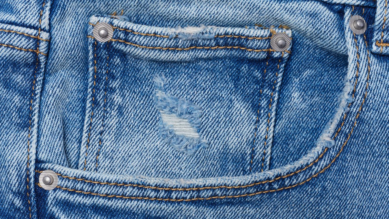 Blue jeans front pocket with buttons