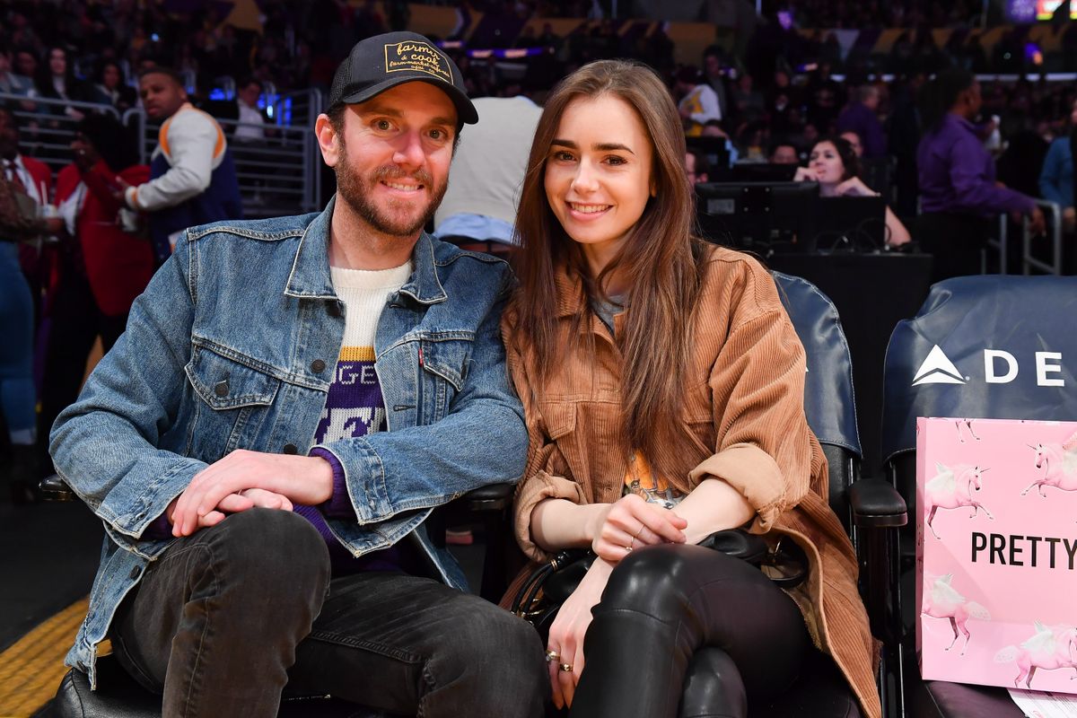 Celebrities At The Los Angeles Lakers Game, Lily Collins Charlie McDowell