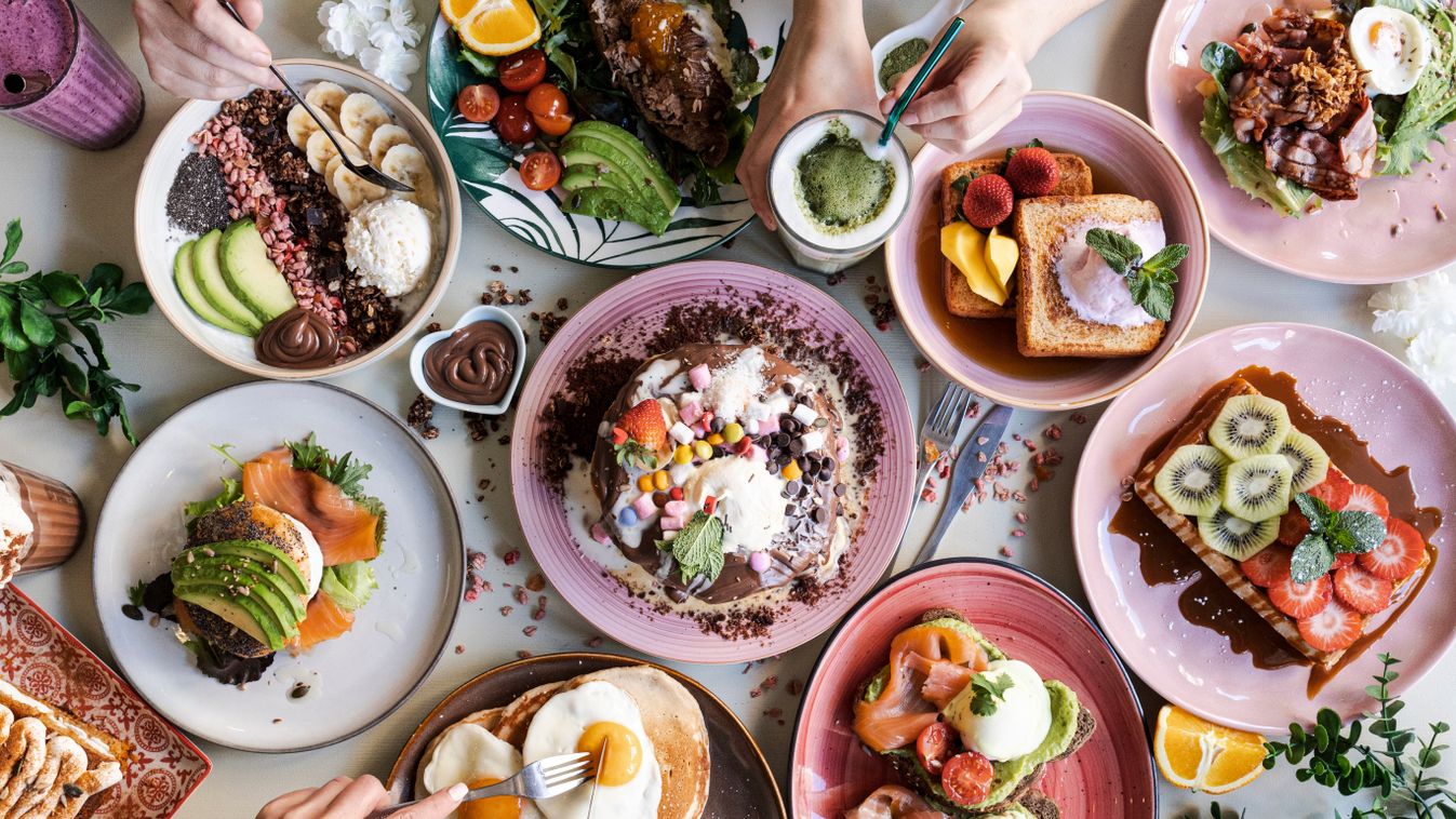 Brunch Choice Crowd Food Concept. Family breakfast or brunch served on a table. Aerial view.