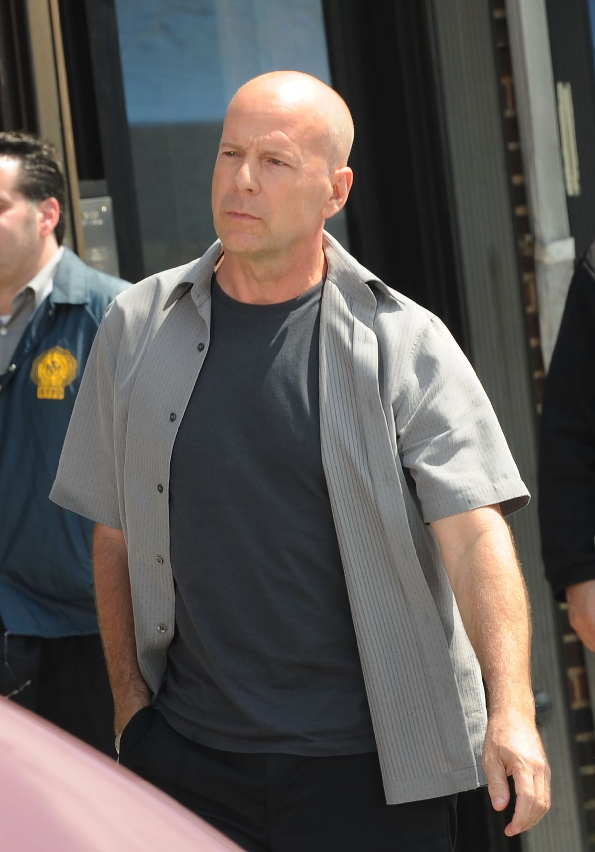 NEW YORK - JUNE 16:  Bruce Willis films on location for "A Couple of Dicks" on the streets of Brooklyn on June 16, 2009 in New York City.  (Photo by Bobby Bank/WireImage)