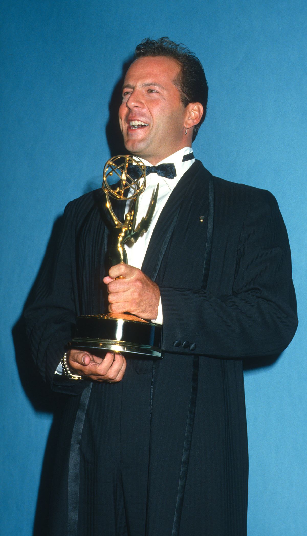 American actor Bruce Willis attends the 39th annual Primetime Emmy Awards at the Pasadena Civic Auditorium, Pasadena, California, September 20, 1987. He won the Outstanding Lead Actor in a Drama Series award for his role in the television show 'Moonlighting.' (Photo by Ron Galella, Ltd./Ron Galella Collection via Getty Images)