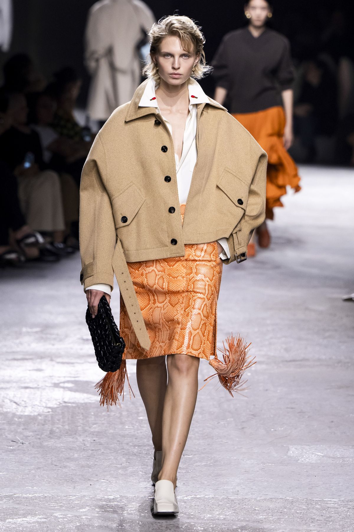 MILAN, ITALY - SEPTEMBER 21: A model walks the runway during the Bottega Veneta Ready to Wear Spring/Summer 2025 fashion show as part of the Milan Fashion Week on September 21, 2024 in Milan, Italy. (Photo by Victor VIRGILE/Gamma-Rapho via Getty Images)