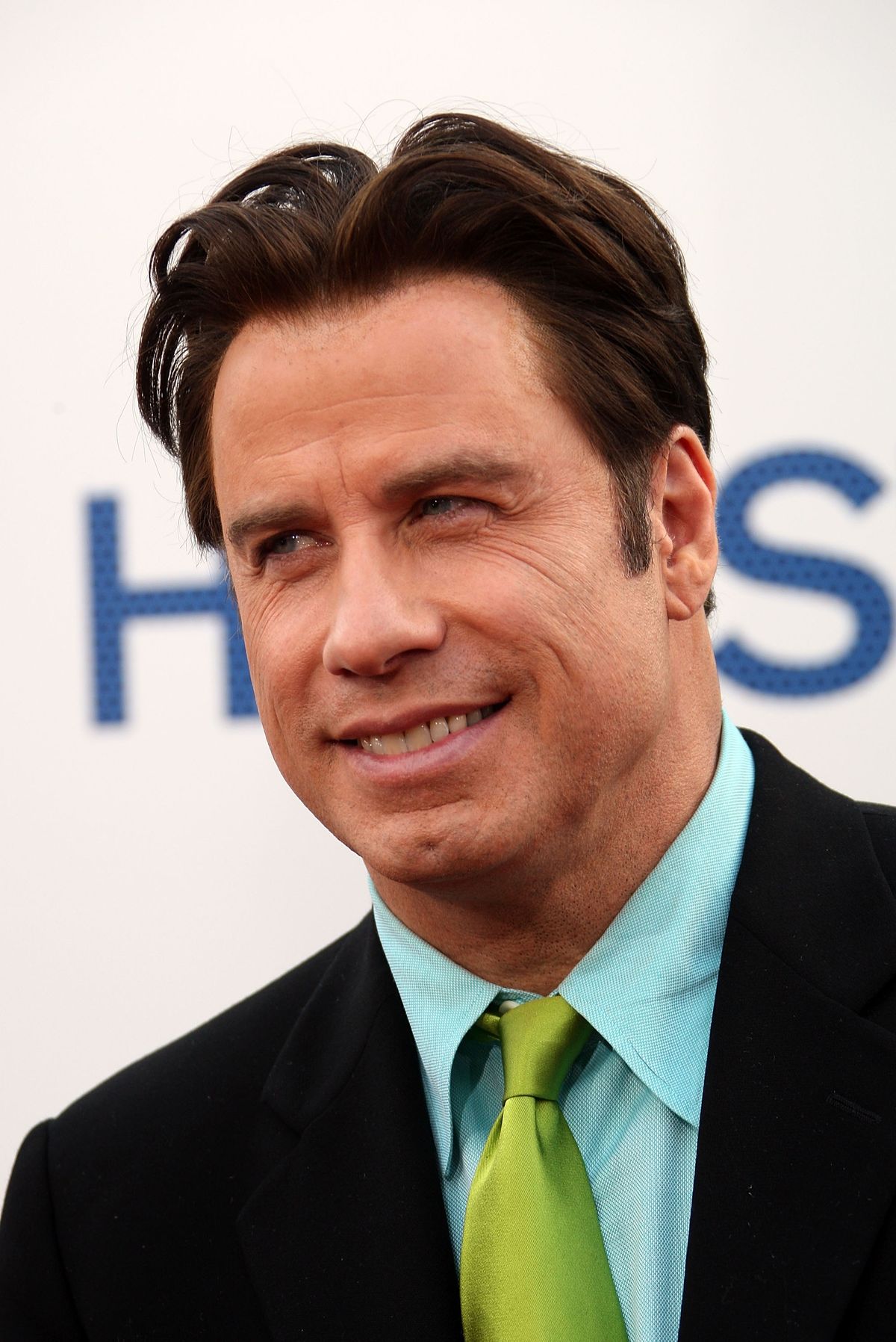 WESTWOOD, CA - JULY 10:  Actor John Travolta arrives to the Los Angeles premiere of New Line Cinema's "Hairspray" held at Mann Village Theatre on July 10, 2007 in Westwood, California.  (Photo by Frazer Harrison/Getty Images)