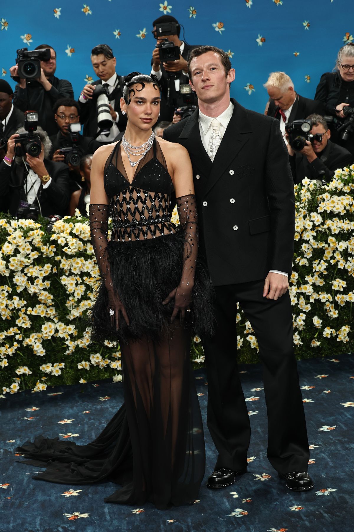 NEW YORK, NEW YORK - MAY 05: (L-R) Dua Lipa and Callum Turner attend the 2025 Met Gala Celebrating "Superfine: Tailoring Black Style" at Metropolitan Museum of Art on May 05, 2025 in New York City.  (Photo by Jamie McCarthy/Getty Images)